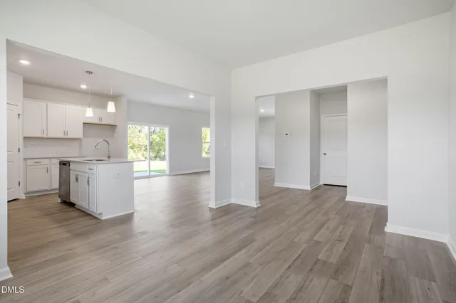 a view of kitchen with wooden floor