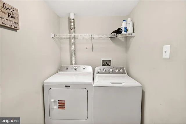 a view of a chairs and table on the deck