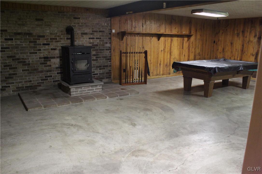 197 Greenzweig Road Kunkletown, PA 18058 - Photo 25 of 27 LL rec room with newer pellet stove