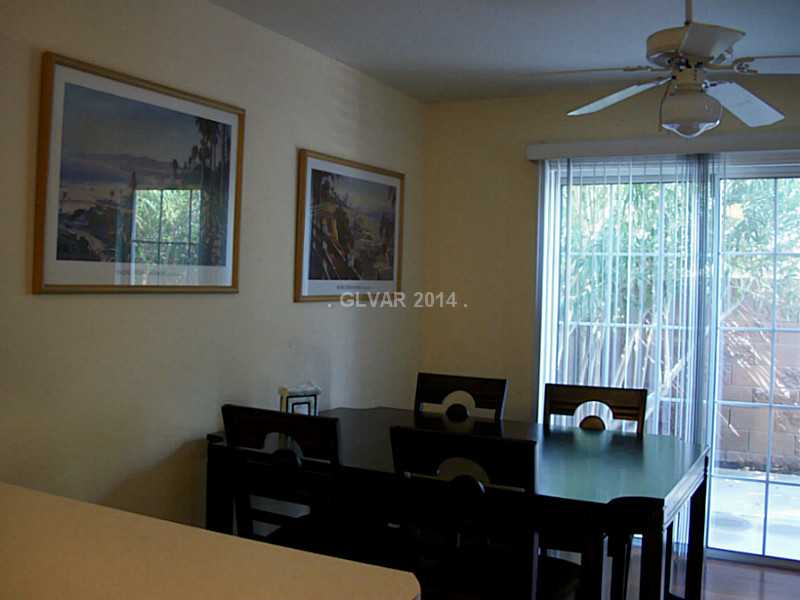 10189 Quaint Tree Street Las Vegas, NV 89183 - Photo 6 of 22 Dining Room. Dining Area that leads out to Patio Area