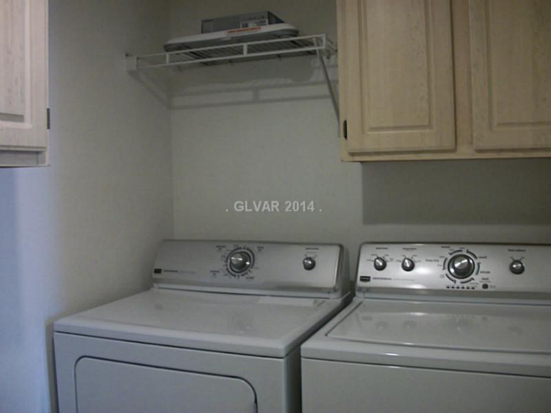10189 Quaint Tree Street Las Vegas, NV 89183 - Photo 9 of 22 Laundry Rm/Area. Laundry Area with storage