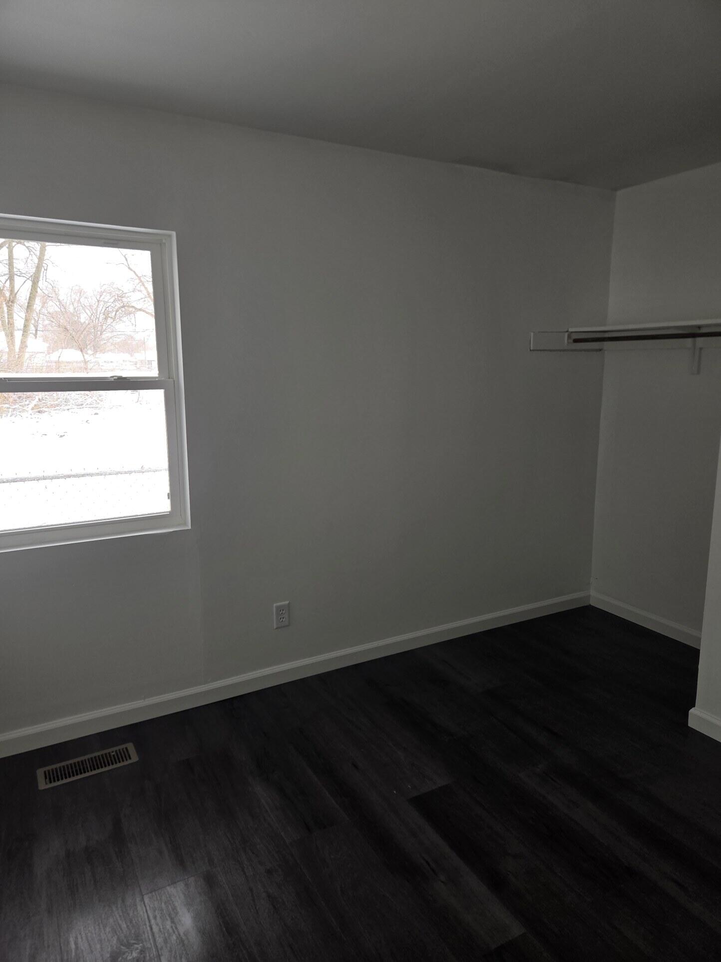 1932 Arthur Street Gary, IN 46404 - Photo 11 of 14 a view of a small space with wooden floor and a window
