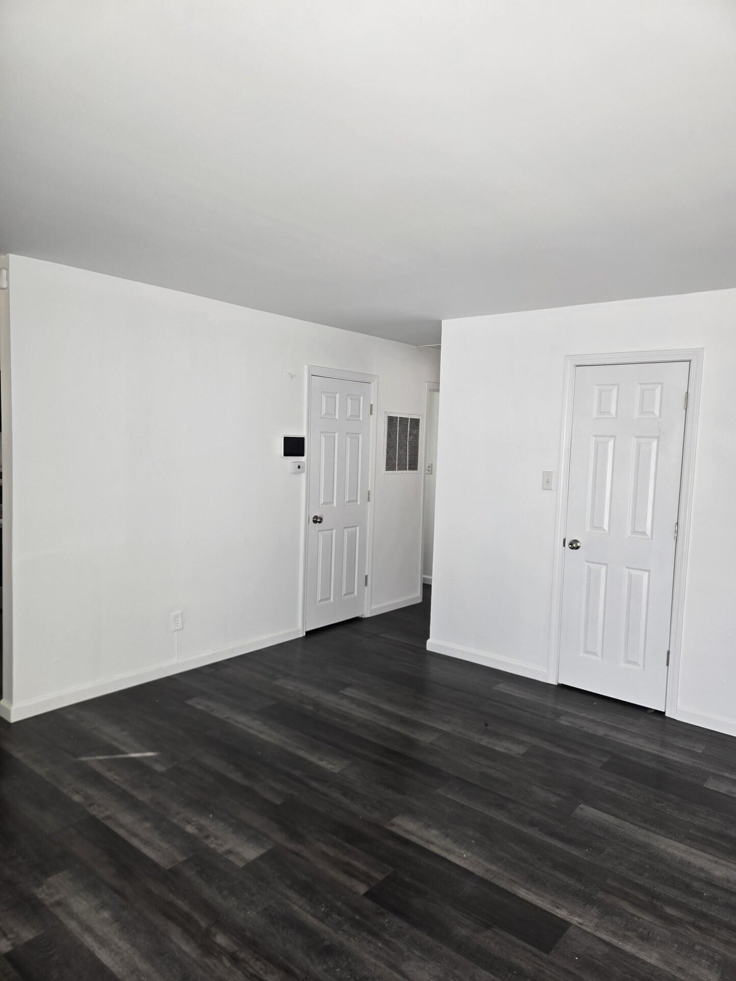 1932 Arthur Street Gary, IN 46404 - Photo 4 of 14 a view of an empty room with wooden floor
