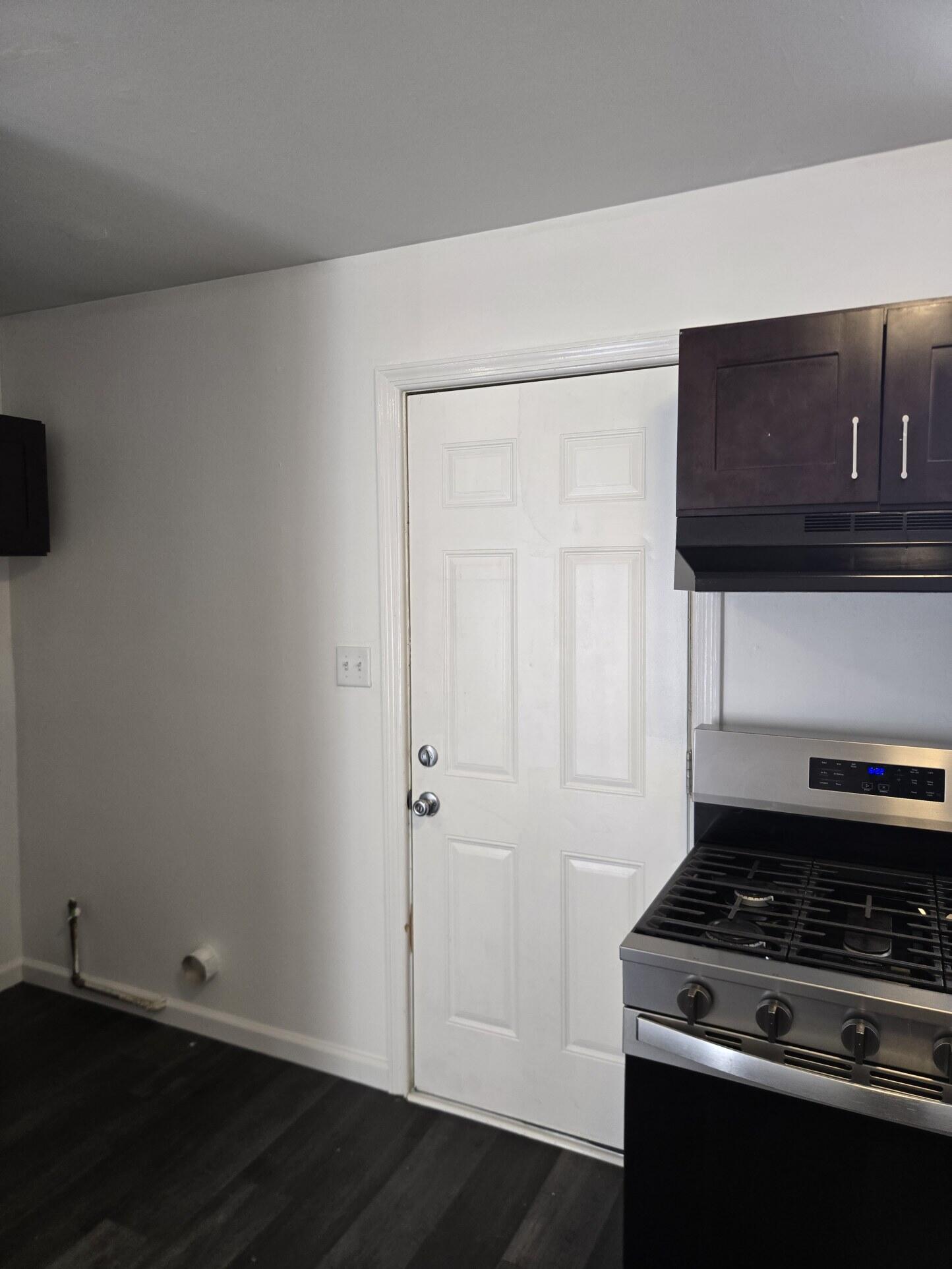 1932 Arthur Street Gary, IN 46404 - Photo 5 of 14 a kitchen with a stove and a microwave