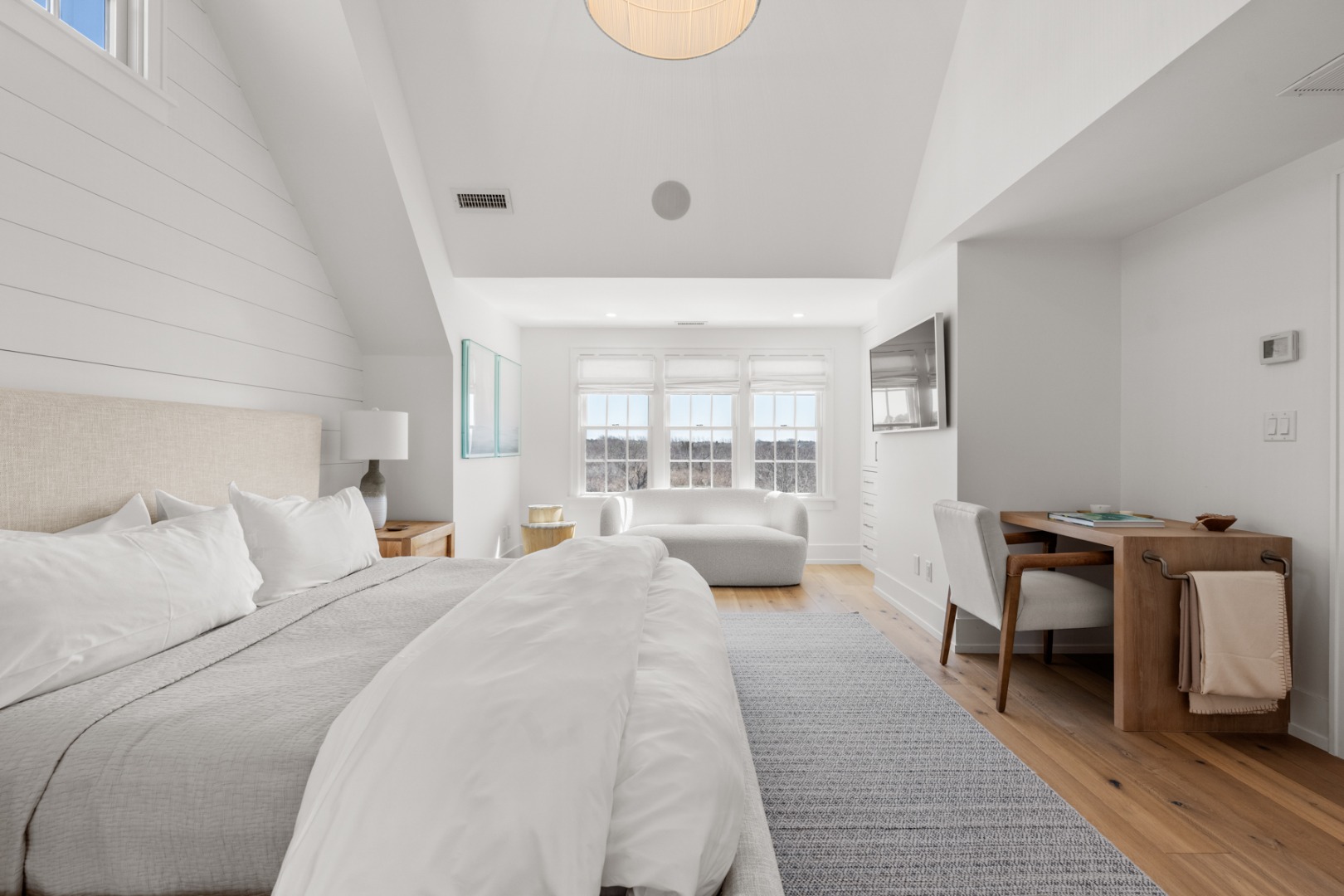 174 Cliff Road Nantucket, MA 02554 - Photo 26 of 49 a large white bed in a white room