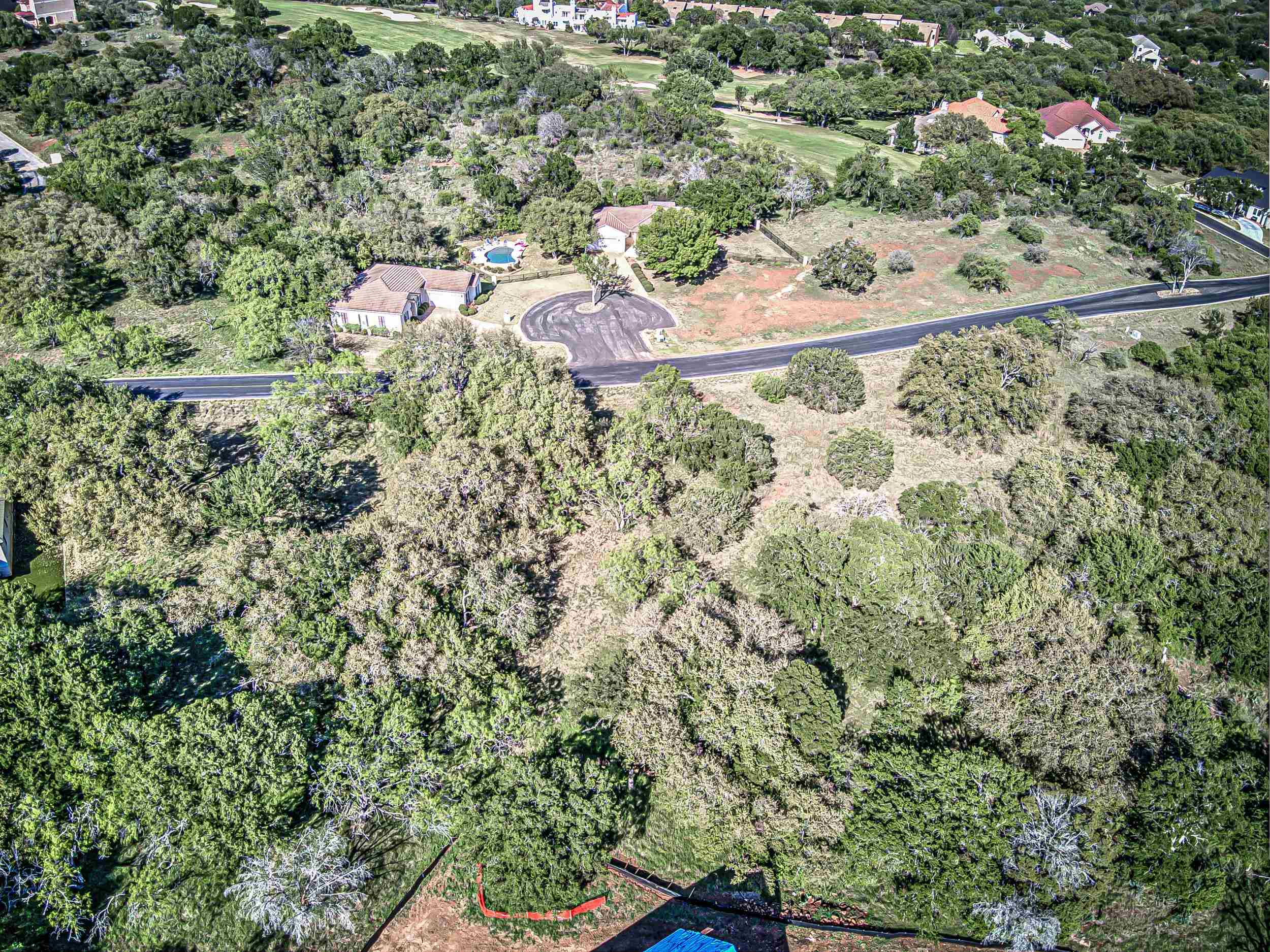 Fault Line Horseshoe Bay, TX 78657 - Photo 14 of 26 an aerial view of residential house with outdoor space and trees all around