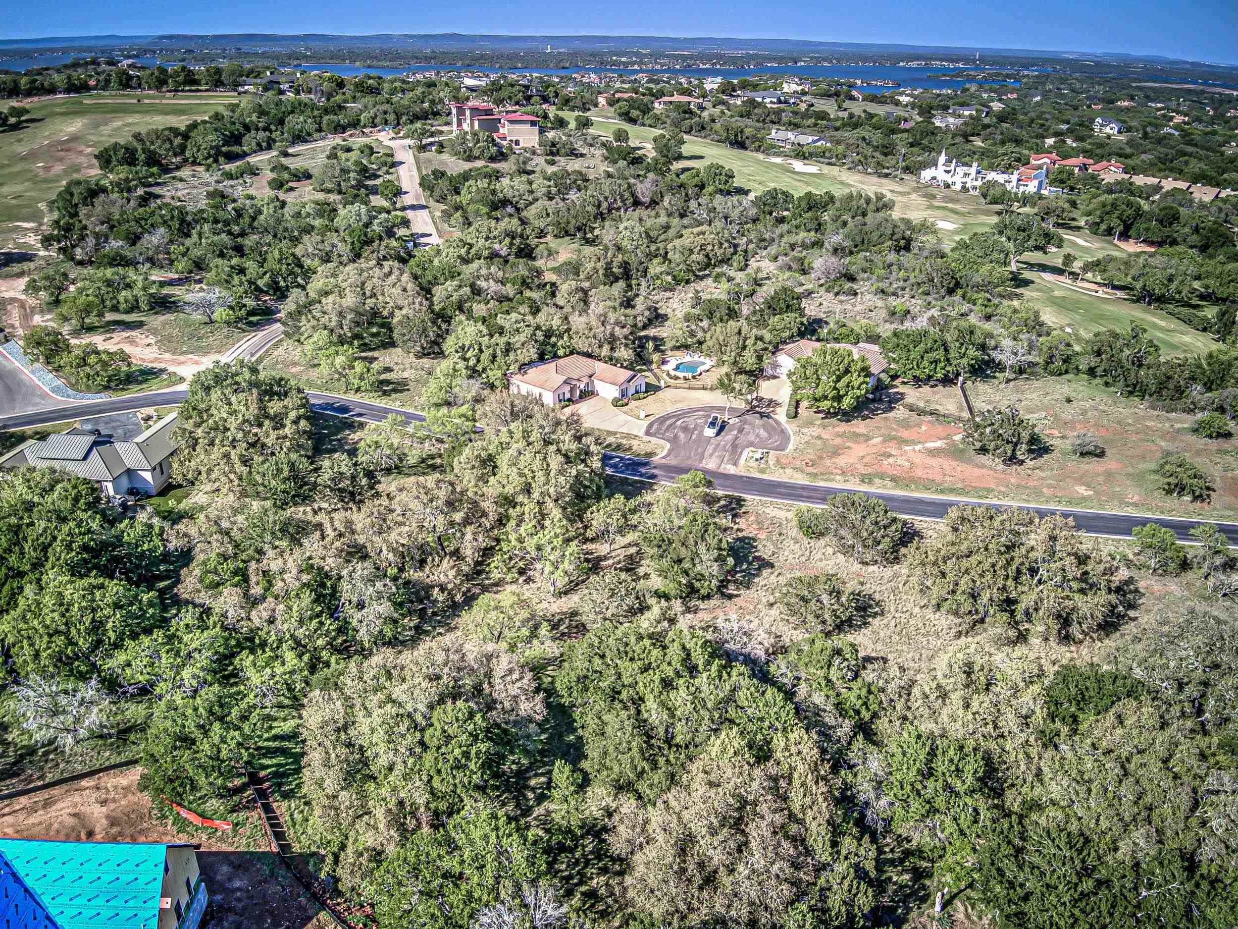 Fault Line Horseshoe Bay, TX 78657 - Photo 15 of 26 an aerial view of residential houses with outdoor space and trees