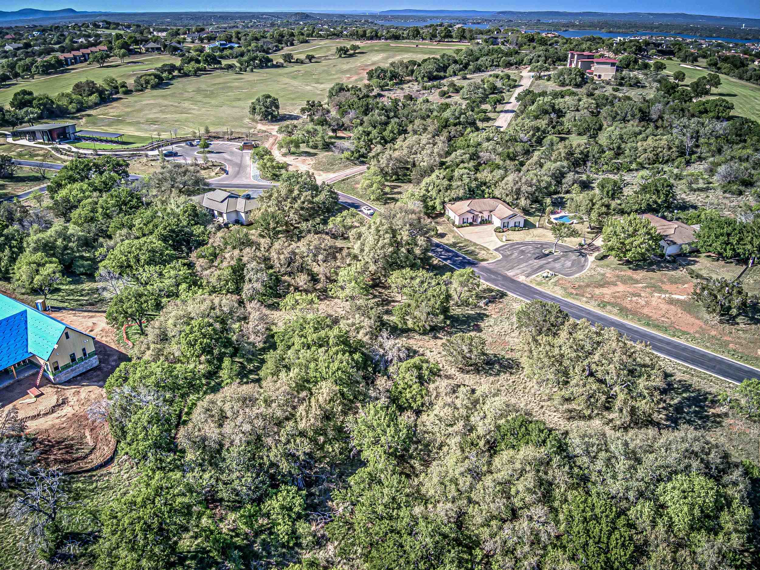 Fault Line Horseshoe Bay, TX 78657 - Photo 16 of 26 an aerial view of residential houses with outdoor space and trees