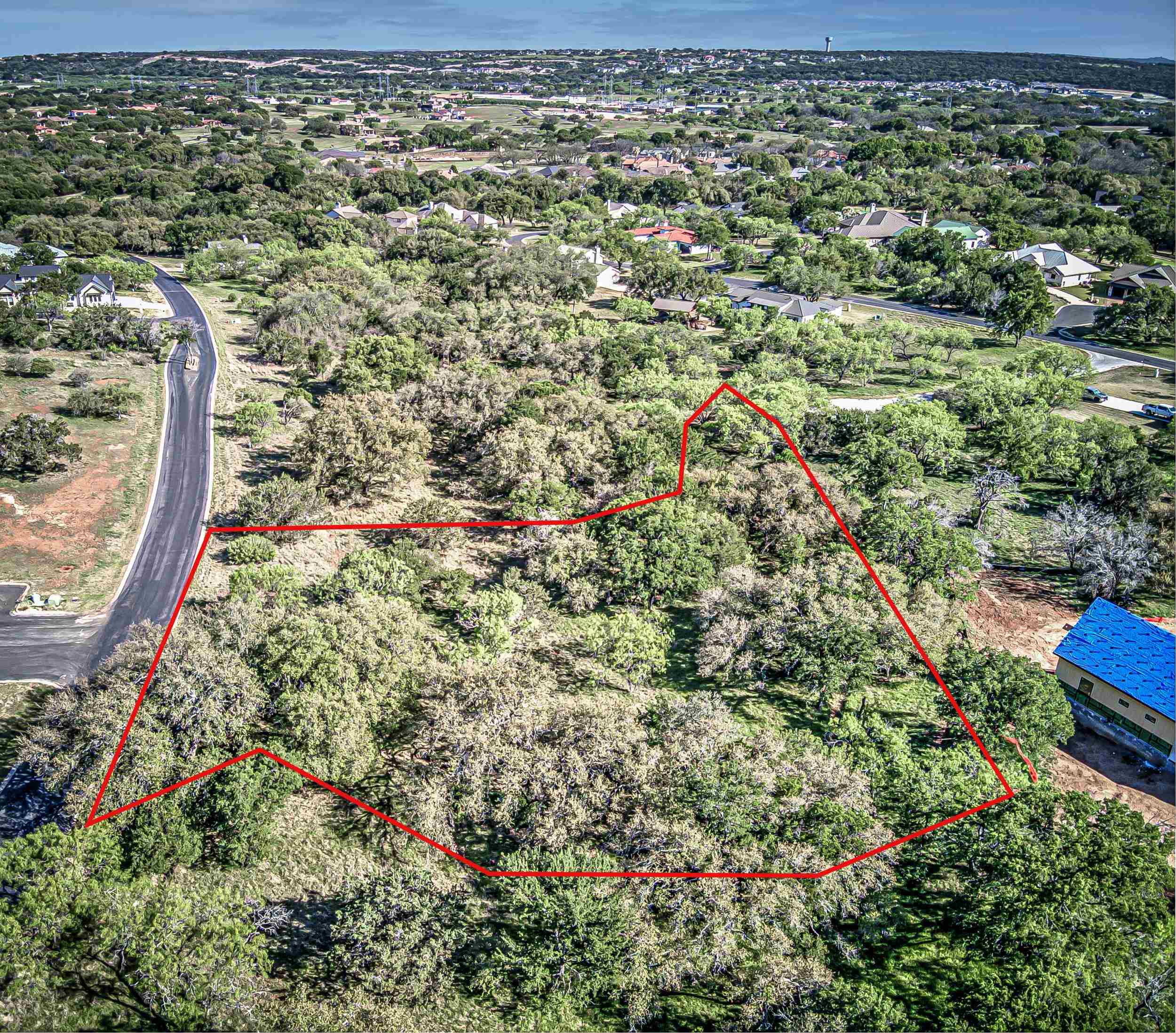 Fault Line Horseshoe Bay, TX 78657 - Photo 24 of 26 a view of a pathway with a flower garden