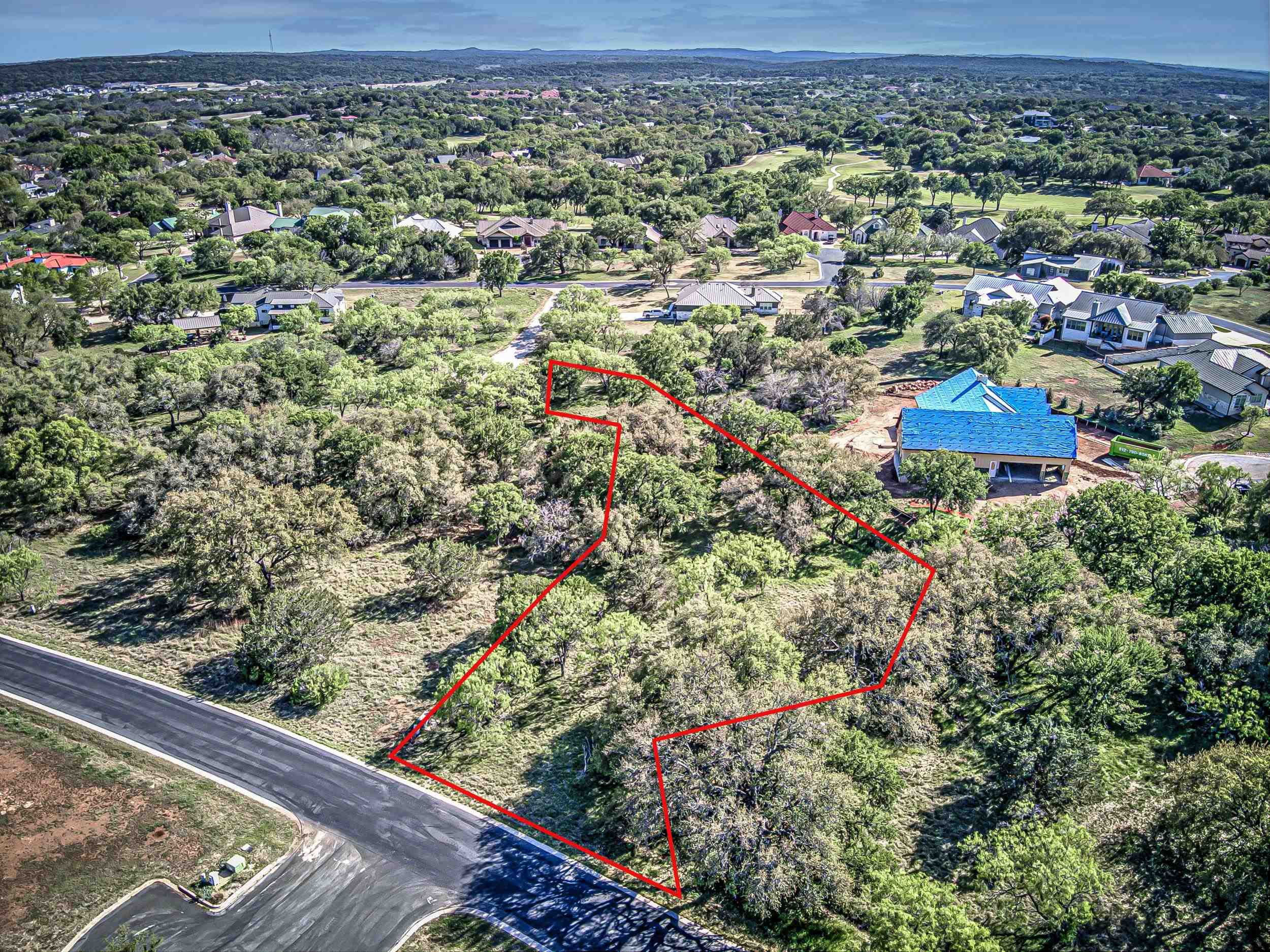 Fault Line Horseshoe Bay, TX 78657 - Photo 4 of 26 an aerial view of residential house with outdoor space and trees all around