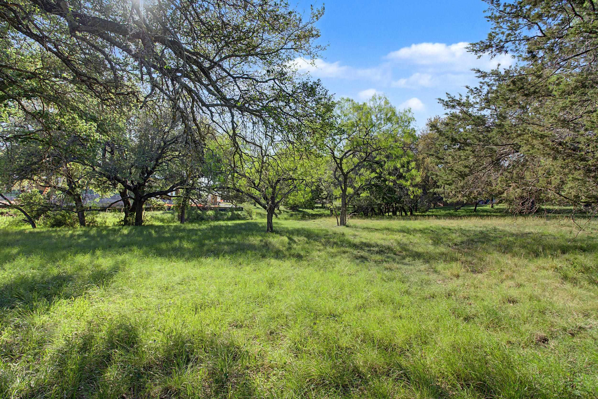 Fault Line Horseshoe Bay, TX 78657 - Photo 8 of 26 a view of outdoor space with green field and trees