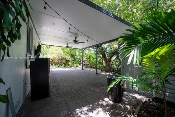 a backyard of a house with lots of green space