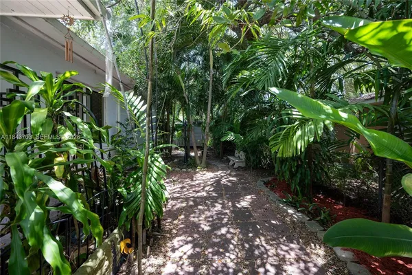a backyard of a house with lots of green space