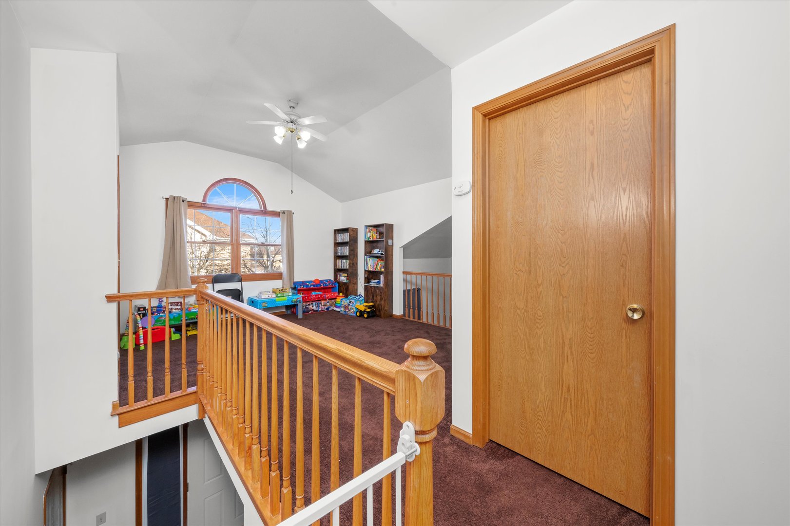 4343 West Emerald Way Street Alsip, IL 60803 - Photo 12 of 44 a view of a hallway with windows and stairs