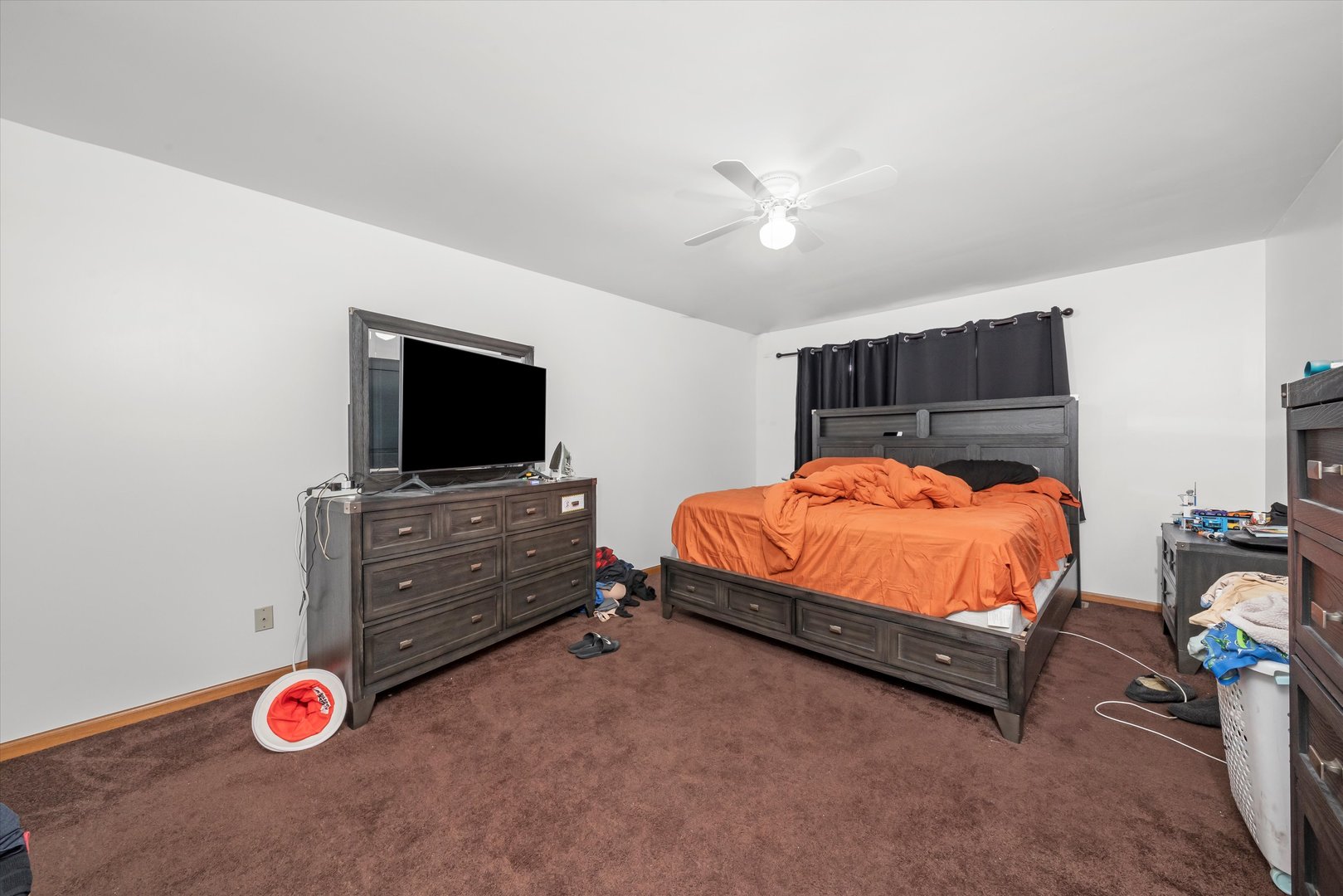 4343 West Emerald Way Street Alsip, IL 60803 - Photo 18 of 44 a bedroom with a bed and flat screen tv