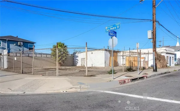 a view of a street with a building