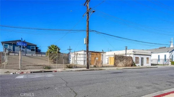 a view of a house with a street