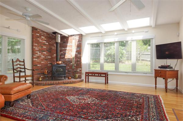 41 Alba Road Wellesley, MA 02481 - Photo 8 of 21 a living room with furniture and a flat screen tv