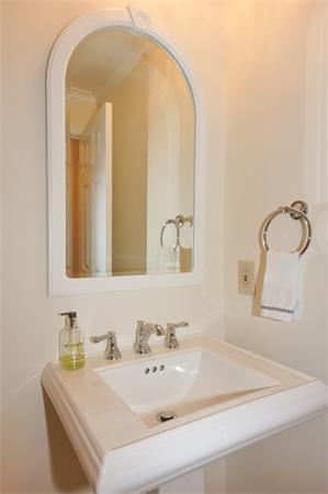 41 Alba Road Wellesley, MA 02481 - Photo 10 of 21 a bathroom with a sink and a mirror