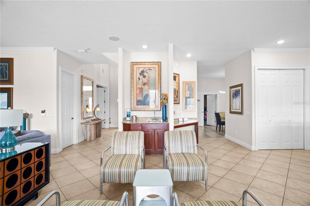 7388 Gathering Court Reunion, FL 34747 - Photo 17 of 56 a view of a dining room with furniture