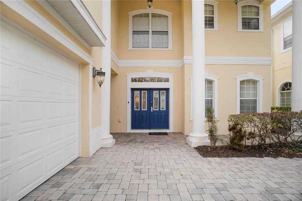 7388 Gathering Court Reunion, FL 34747 - Photo 2 of 56 a view of entrance front of house