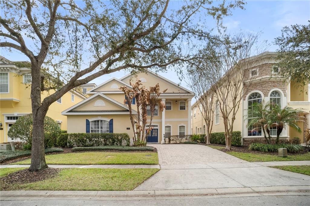 7388 Gathering Court Reunion, FL 34747 - Photo 3 of 56 a front view of a house with a yard