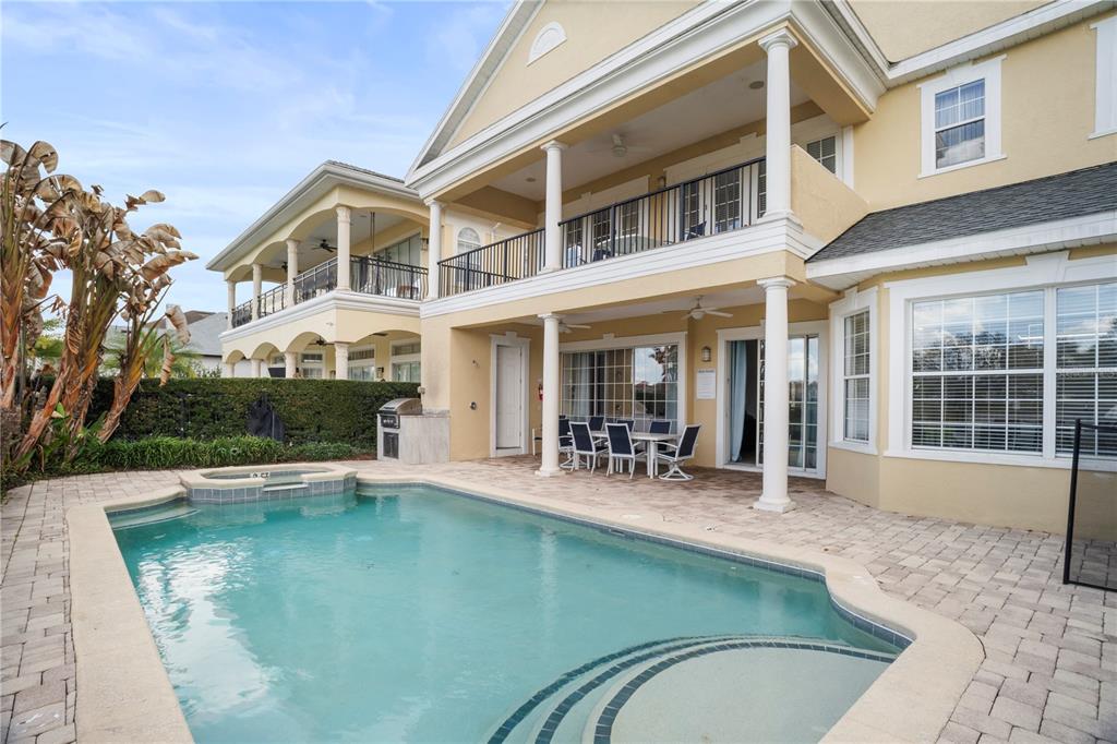 7388 Gathering Court Reunion, FL 34747 - Photo 50 of 56 a view of a house with swimming pool and sitting area
