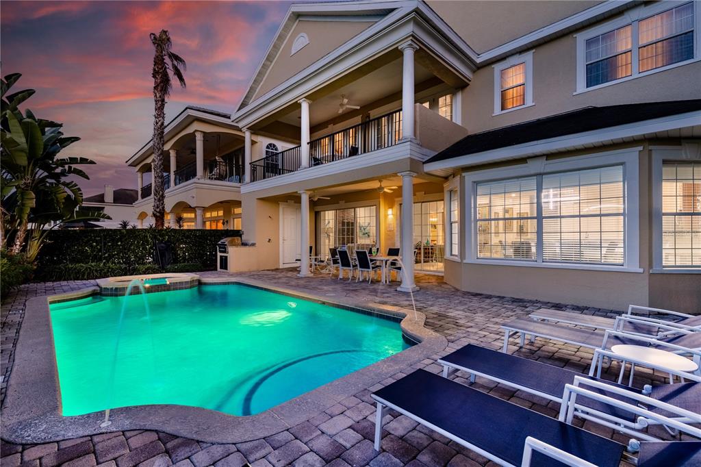 7388 Gathering Court Reunion, FL 34747 - Photo 52 of 56 a view of a house with a swimming pool