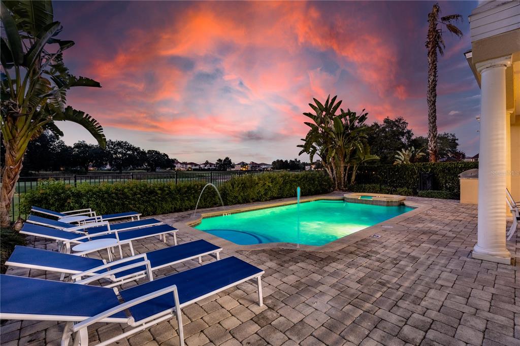 7388 Gathering Court Reunion, FL 34747 - Photo 53 of 56 a view of a backyard with sitting area