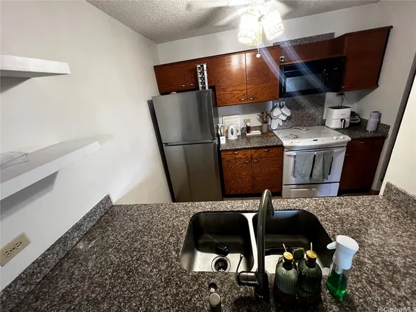 a bedroom with furniture and flat screen tv
