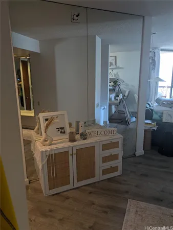 a view of a bathroom with a sink and mirror
