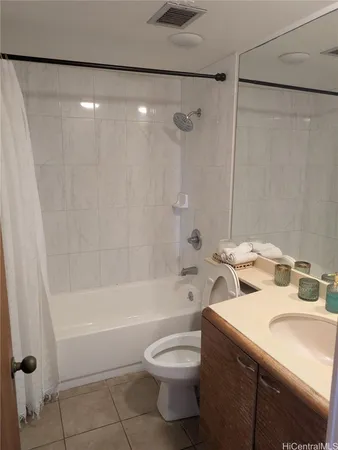 a bathroom with a sink a toilet and a bathtub
