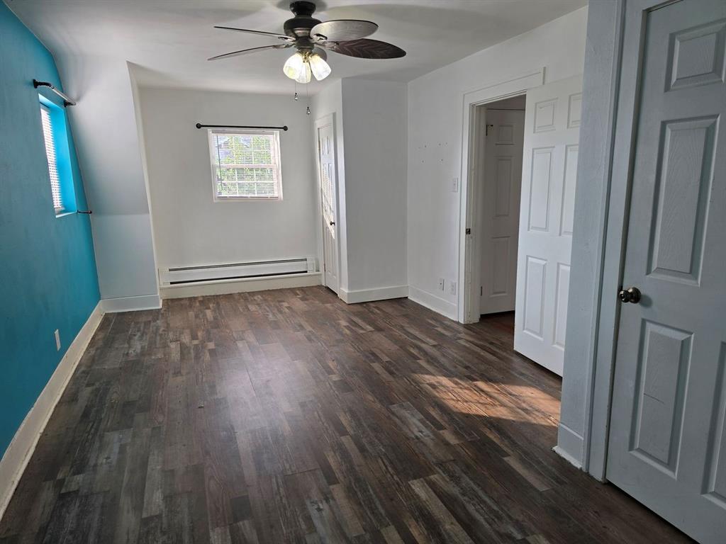 1008 Manor Road New Kensington, PA 15068 - Photo 34 of 39 wooden floor in an empty room with a mirror
