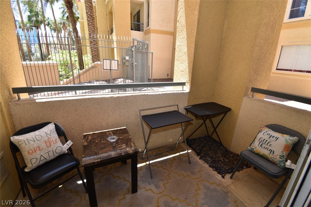 210 East Flamingo Road, Unit 137 Las Vegas, NV 89169 - Photo 23 of 32 A quiet private patio provides a refreshing retreat with neighborhood views.