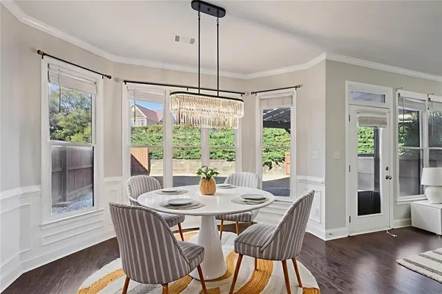 a dining room with furniture window wooden floor