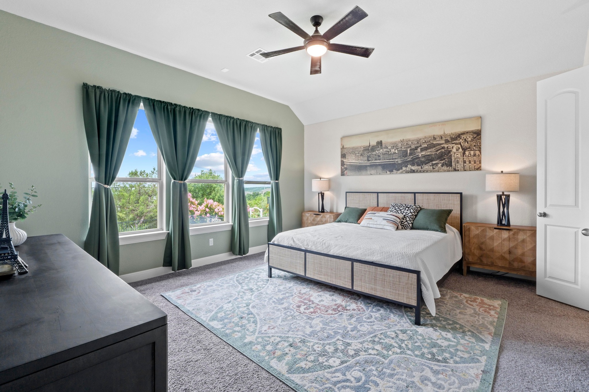 1329 Siena Sunset Road Leander, TX 78641 - Photo 15 of 33 Master bedroom overlooks the pool and sylvan setting of the green forest area. What a view to wake up to each morning!