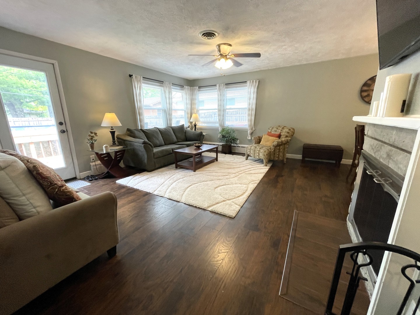 1608 Chevy Chase Drive Champaign, IL 61821 - Photo 11 of 53 a living room with furniture and a fireplace