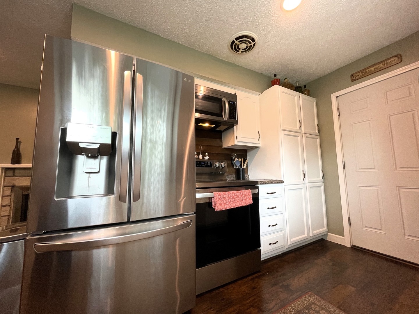 1608 Chevy Chase Drive Champaign, IL 61821 - Photo 15 of 53 a kitchen with stainless steel appliances a refrigerator and a stove top oven
