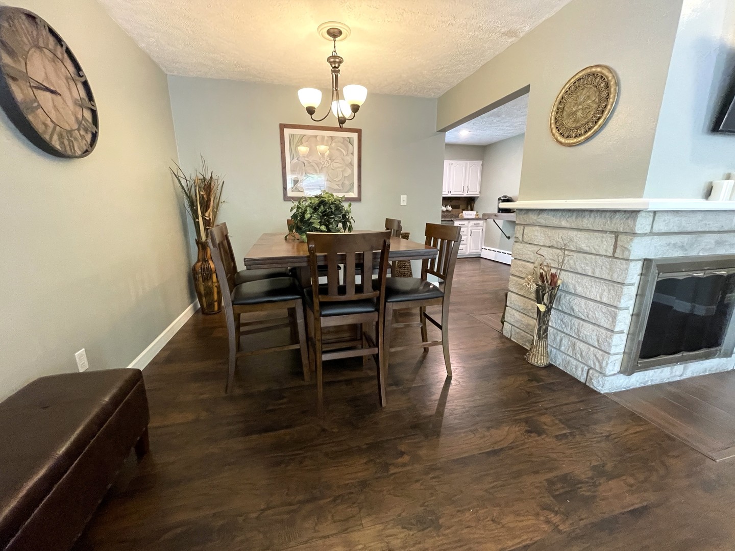 1608 Chevy Chase Drive Champaign, IL 61821 - Photo 24 of 53 a view of a dining room with furniture and a chandelier
