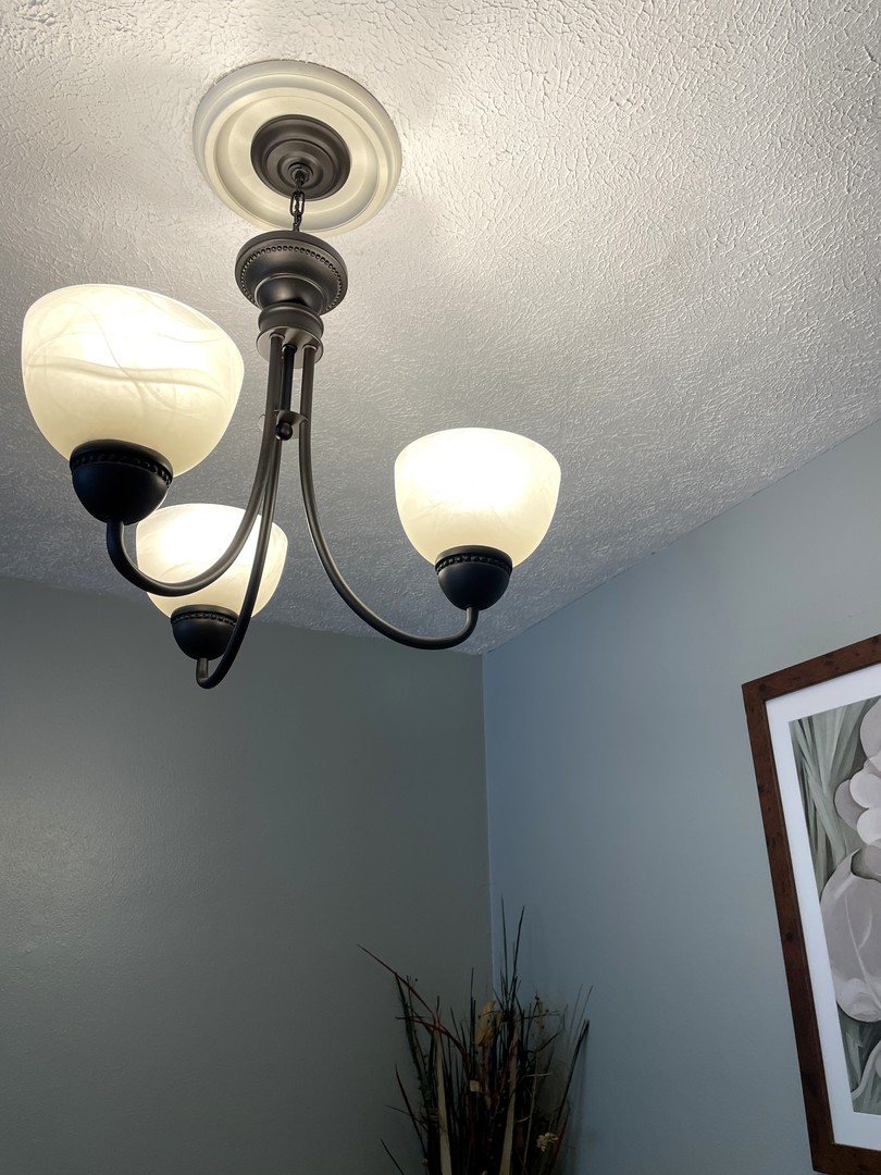 1608 Chevy Chase Drive Champaign, IL 61821 - Photo 25 of 53 a picture of a wall with a mirror