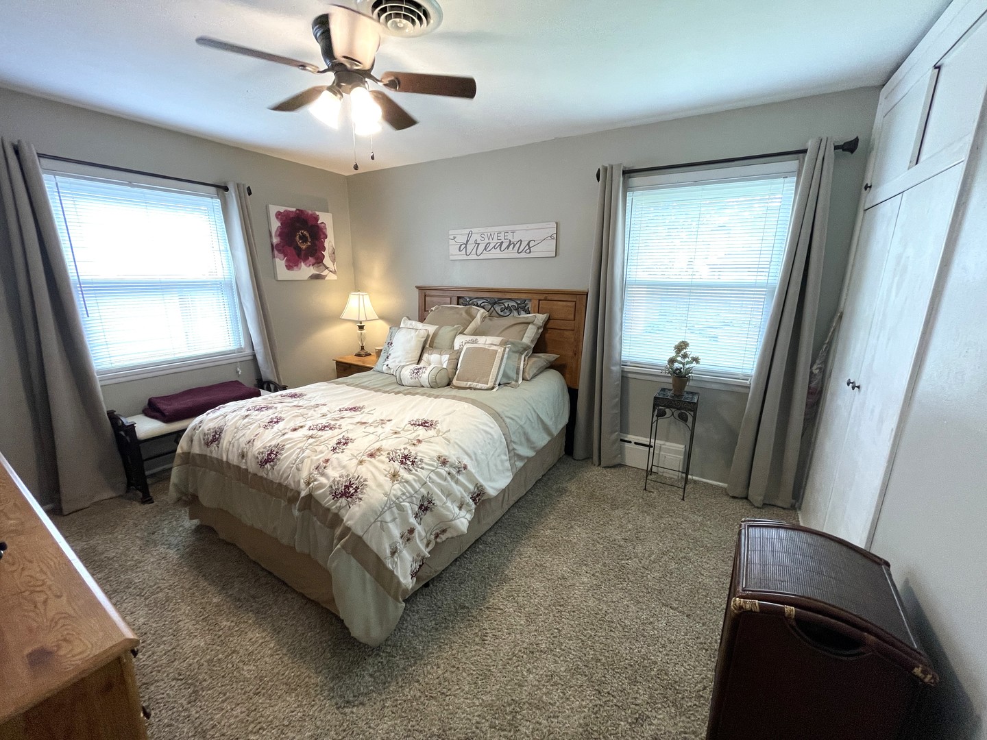 1608 Chevy Chase Drive Champaign, IL 61821 - Photo 28 of 53 a bedroom with a bed and a chandelier