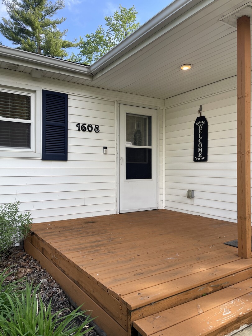 1608 Chevy Chase Drive Champaign, IL 61821 - Photo 3 of 53 a view of a livingroom with an outdoor space