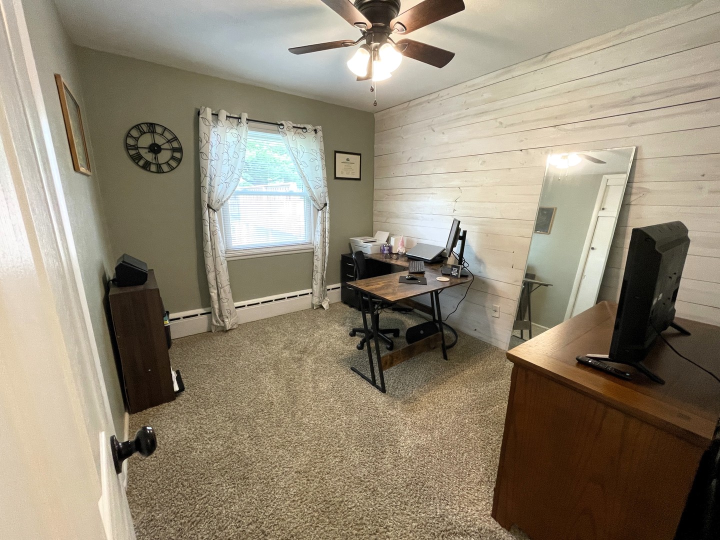 1608 Chevy Chase Drive Champaign, IL 61821 - Photo 36 of 53 a view of a workspace with furniture and a window