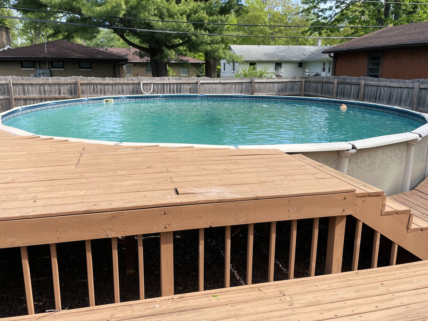 1608 Chevy Chase Drive Champaign, IL 61821 - Photo 42 of 53 a view of a house with a swimming pool and a yard