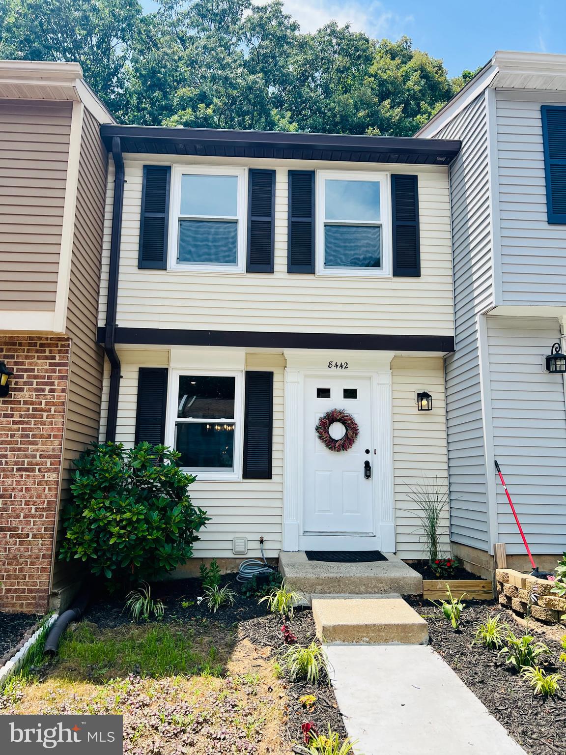 8442 Sugar Creek Lane Springfield, VA 22153 - Photo 39 of 39 a front view of a house with a yard