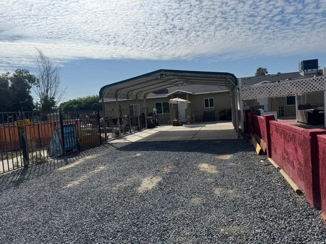 a view of a backyard of the house