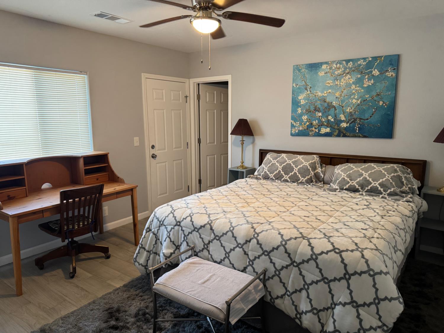 3280 McCall Avenue Selma, CA 93662 - Photo 8 of 56 a bedroom with a bed and a workspace