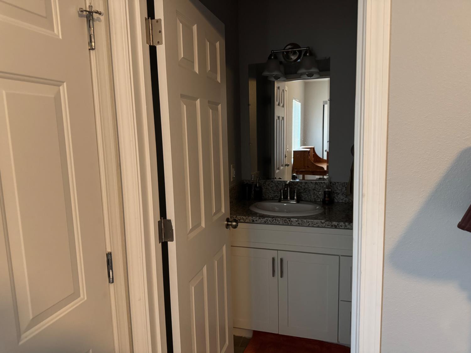 3280 McCall Avenue Selma, CA 93662 - Photo 10 of 56 a bathroom with a sink and a mirror