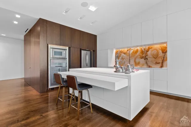 a room with a table and a workspace