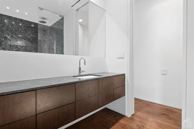 a view of house with swimming pool outdoor seating